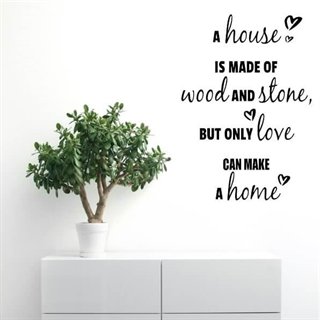 Väggdekor med texten A Home is made of Love