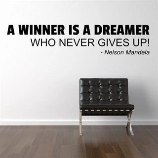 Wallstickers citat med texten. A winner is a dreamer