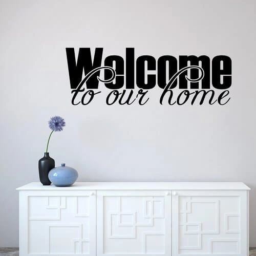 En wallstickers med texten - WELCOME TO OUR Home.