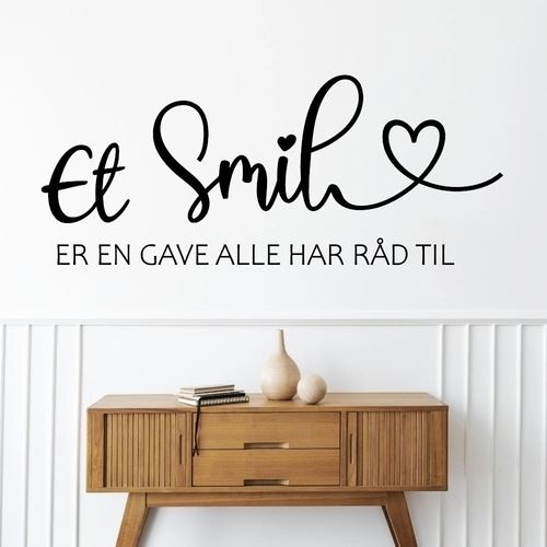 Ett leende är en presentväggklistermärke skriven med versaler