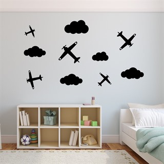 Dröm dig bort med denna väggdekor med Flygplan och moln